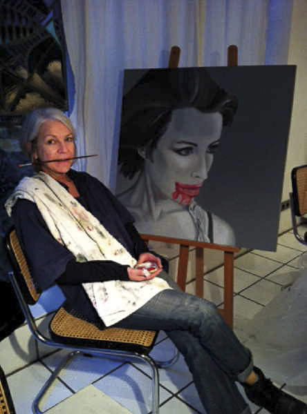 Die Malerin Angela an der Staffelei